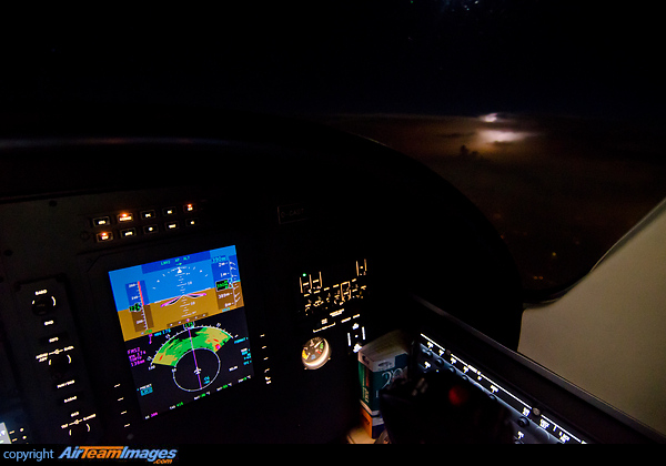 Passing a thunderstorm as visble thru the window and on weather radar Cessna 525B CitationJet CJ3