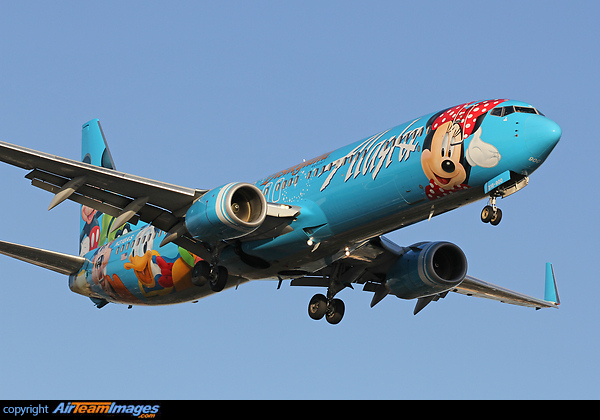 Alaska Airlines B737-900 N318AS wears a special Disney scheme. Boeing 737-990