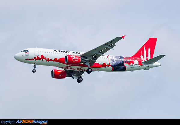 "A true Malaysian" on approach, honouring "Dr M." (Mahathir bin Mohamad, the fourth prime minister of Malaysia). The skyline shown features many well-known buildings like the Petronas Twin Towers, Kuala Lumpur Tower, and Multimedia Super Corridor Putrajaya Airbus A320-216