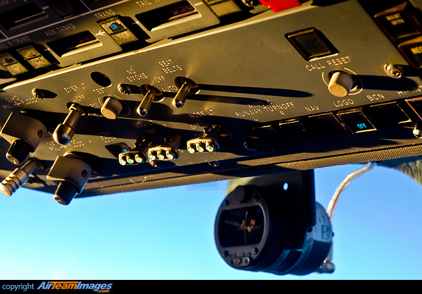 Upper instrument panel with the light switches and the standby compass. McDonnell Douglas MD-11F