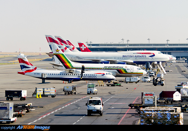 An ATR72 of Comair, followed by a classic UM 737 and two BA Jumbos (G-BNLF, G-CIVO), Virgin Atlantic A340-600 G-VSSH and a Swiss tail. SAA's 737-800 ZS-SJT is just taxiing out. Johannesburg Int. Airport