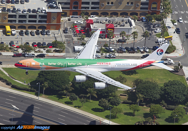 China Eastern Airlines Airbus A340-600 B-6055 on final approach past In n Out Burger at Los Angeles. Airbus A340-642