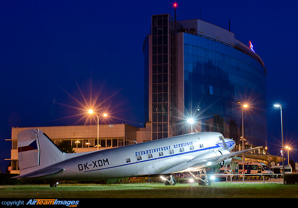 CSA's vintage Douglas DC-3 on display in front of CSA's modern headquarter building at Prague International Airport Douglas DC-3-229