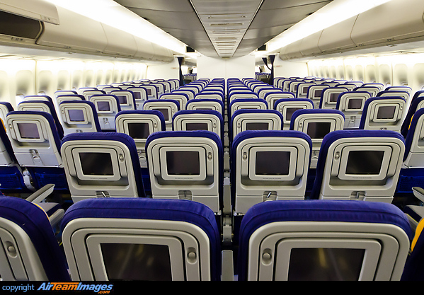 Economy Class with passenger entertainment system installed. Boeing 747-430