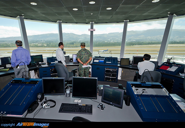 View into the operations room of the Air Traffic Control Tower at the new Quito Airport with a LAN Equador A320 being towed outside and the mountain panorama visible as well. Quito - Mariscal Sucre ATC