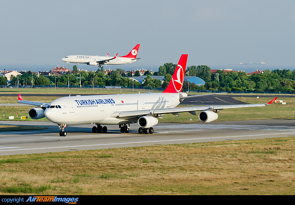Turkish Airlines Boeing 737-800 TC-JGM is landing on runway 05 in the background. Airbus A340-313X