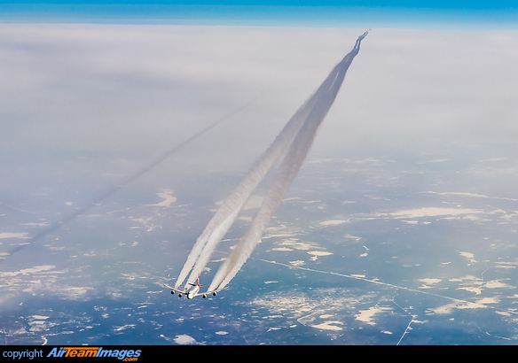 Passing head-on around FL320. Boeing 747-8R7F/SCD