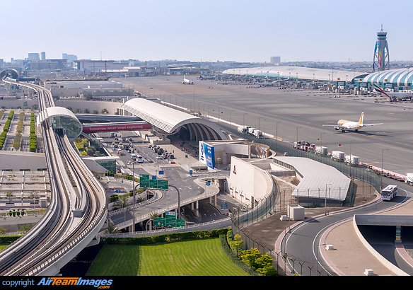 Terminal 3 entrance and metro station on the left side and terminal building on the right. Dubai International Airport
