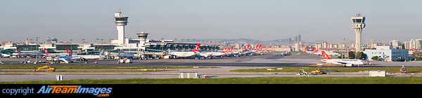 Panoramic view of Istanbul Ataturk Airport from the west towards the east. On the left side is the terminal building and on the right the air traffic control tower. Aspect ratio of the image is 5:1. Istanbul Ataturk Airport
