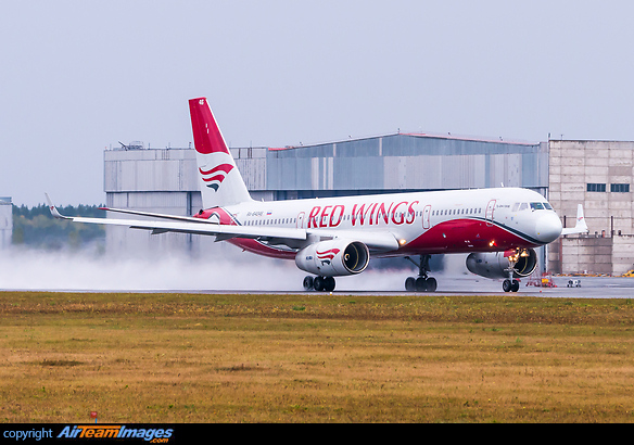 Departure during rainy weather Tupolev Tu-204-100B