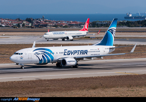 With special "New Suez Canal" sticker. In the background is Turkish Airlines Boeing 737-800 TC-JYI. Boeing 737-866