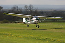 Bagby based Reims F172H departing the airfield in strong winds