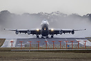 Qantas 9 for Singapore departs from a very wet runway 27 at Melbourne ...