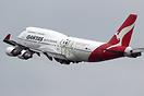 This Qantas Boeing 747-400 is now displaying "Come Play" titles in sup...