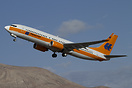 This B737 flies in old colour scheme, without additional Kreuzfahrten ...