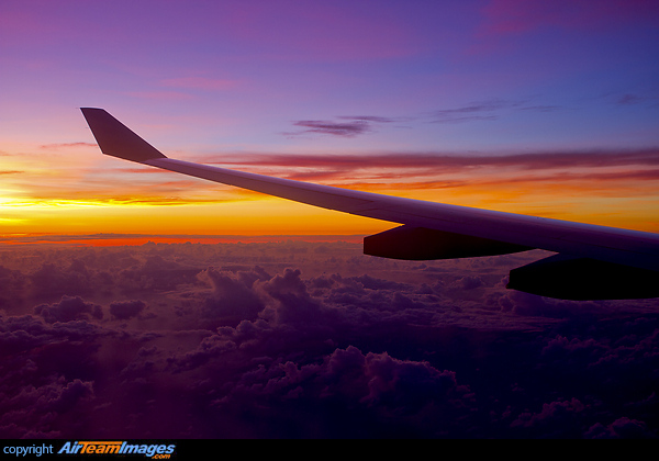 Over the Coral sea Jetstar 25 is about to commence descent with a spectacular sunrise into Cairns after a night flight from Tokyo's Narita airport. Photo Carla Jenkins. Airbus A330-202