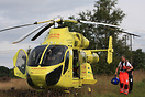 The Yorks Air Ambulance helicopter in a Forest Location attending a Cl...