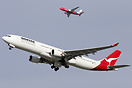 Parallel runway operation at there best as a Virgin Blue 737 breaks aw...