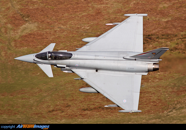 RAF/BAe Systems test aircraft, Eurofighter Typhoon FGR4 ZJ938 (IPA6) banking into the M6 Pass whilst on a low level flight in Tebay, Cumbria. Distinctive by its coat of arms and unique red, white and blue tail decal. Eurofighter Typhoon FGR4