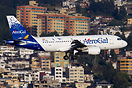An AeroGal Airbus A319 HC-CKL landing in Quito here seen with the moun...