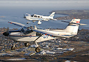 SAAB MFI-15 (OY-ILB) in formation with Piper PA-28-236 Dakota (OY-BNW)