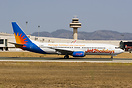 Wearing the Jet2 holidays colours.