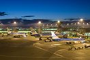 A mix of the KLM fleet under an approaching dawn