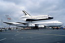 Carrying space shuttle "Enterprise" on its back.