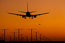 Dusk arrial for a South West 737 at an every busy LAX.