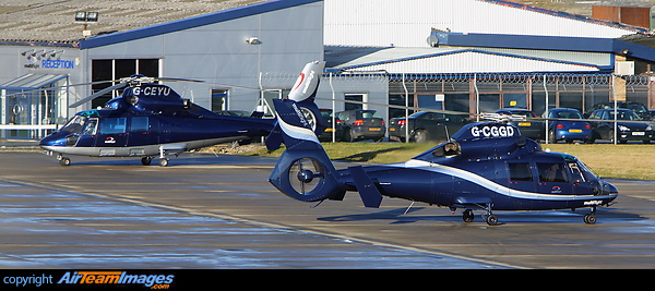 Multiflight's pair of Dauphin 2 Corporate Helicopters G-CGGD and G-CEYU seen here parked outside their own offices which is quite a rare sight at Leeds airport. Aerospatiale AS-365N Dauphin 2