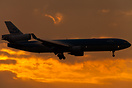 MD-11 on final approach at sunrise.