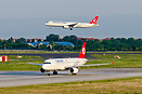 Flights are approaching on a crossing runway compared to the departing...
