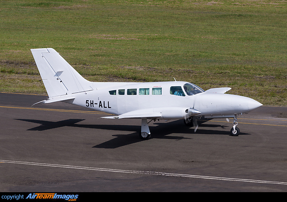 Small Tanzanian operator in all-white c/s. Cessna 402C