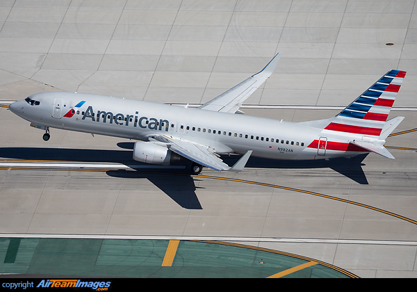 With the wheels just lifting off an AA 738 departs LAX for JFK. Boeing 737-823