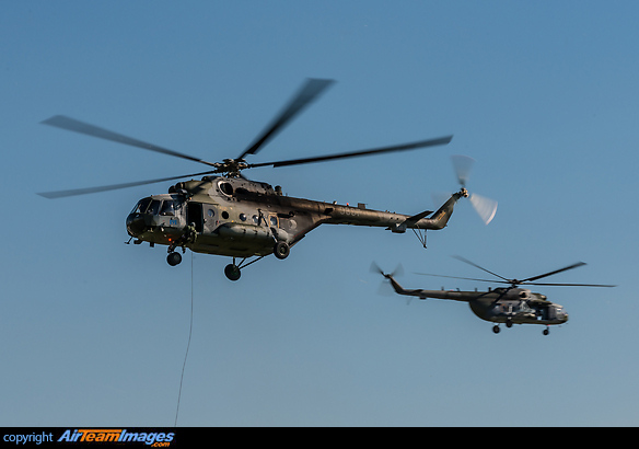 Simulating a search and rescue mission with one helicopter securing the perimeter. Mil Mi-17-1