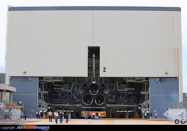 Space Shuttle Orbiter "Atlantis" prepares to leave Orbiter Processing Facility #2 for the last time. She is sitting the special flatbed mover which will transport her over to the Vehicle Assembly Building for temporary storage. This marks the end of the post last space shuttle flight processing. Rockwell Space Shuttle