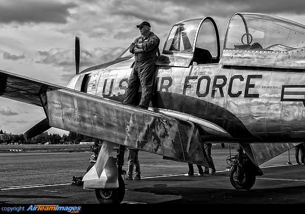 Captain Ron Morrell taking in the Olympic Airshow from the wing of his beautiful 1953 North American T-28A Trojan, one of the planes flying in the Cascade Warbirds group. North American T-28A Trojan