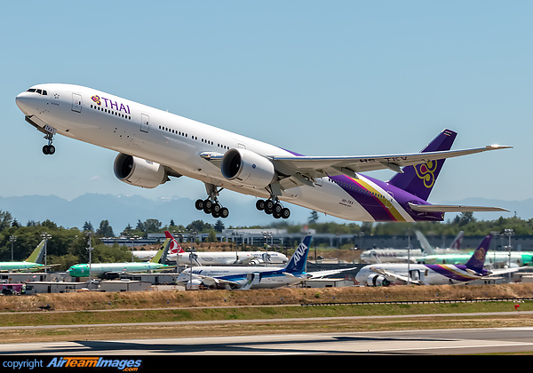 Thai Airways International Boeing 777-3D7(ER) HS-TKV C/N 42111 L/N 1215 departing Paine Field to the north on its delivery flight today. The plane carries the name "Suchitra" on its side. Boeing 777-3D7/ER
