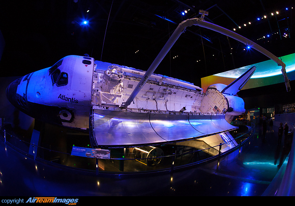 Space shuttle Atlantis, the final orbiter among NASA's spaceplane fleet to fly in space, launched on its new mission on June 29th 2013 as the centerpiece of a $100 million tourist attraction in Florida.
Inside the five-story building, Atlantis has been mounted 30 feet (9 meters) above the ground and angled 43.21 degrees to one side. The shuttle's payload bay doors have been opened and a detailed replica of its robotic arm has been installed and extended such that it just reaches over the heads of visitors.
Theatrical lighting and a 40-foot-long (12-meter) animated digital backdrop helps complete the illusion that Atlantis is back in space, orbiting the Earth. Rockwell Space Shuttle