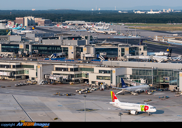 View on Frankfurt's Terminal 1A in the foreground, Terminal 1B and C in the middle and the apron of Terminal 2 in the background with dozens of different airlines present. Frankfurt Main Airport