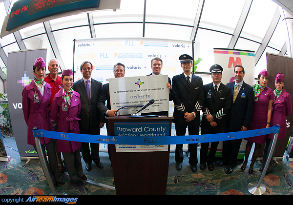The Volaris crew who flew the inaugural flight poses in Terminal 4 at FLL at the ceremony. Flight inauguration event and press conference with top officials, executives and dignitaries from Volaris, Broward County Aviation, the Greater Fort Lauderdale Convention & Visitors Bureau (GFLCVB) and the Consul General of Mexico for the launch of new nonstop service between Fort Lauderdale-Hollywood International Airport and Mexico City.
Volaris started two new routes to connect Mexico City with Ft. Lauderdale-Hollywood International Airport (FLL) on December 1 2014 and with Guadalajara flights on December 4 2014. Mexico City flights will operate four days a week and Guadalajara flights two days a week. Fort Lauderdale - Volaris