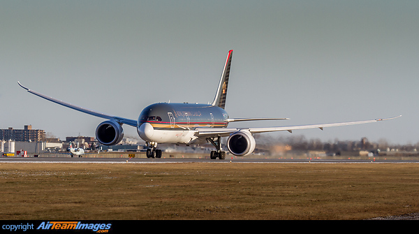 Battling heavy crosswinds, this Dreamliner rolls down the runway for takeoff. Boeing 787-8 Dreamliner