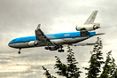 KLM MD-11 PH-KCD "Florence Nightingale" appearing out of heavy fog on ...