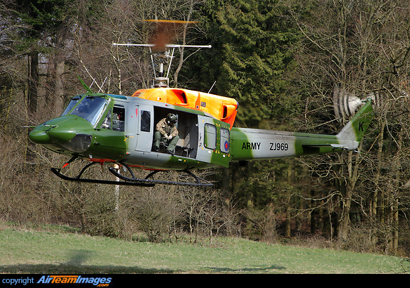 Middle Wallop based Bell 212 AH.1 ZJ969 on confined area landing practice at the 'triangle' in the Lindens, a wooded area used for training near Everleigh on Salisbury Plain. Bell 212HP AH1