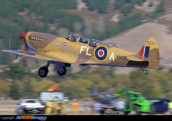 Spitfire MH367 departing at Omaka whilst in the background Focke-Wulf 190 ZK-RFR is attended by the emergency services after suffering an accident during practice day, when one of the brakes failed after landing and the aircraft looped, causing the gear to collapse. Supermarine 509 Spitfire T9