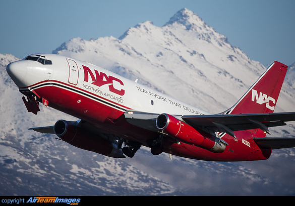 Everything that Anchorage is famous for here in one photograph as a well travelled 737-200 fitted with a gravel kit departs with the spectacular Alaskan range as a backdrop. Boeing 737-232/Adv