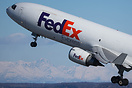Beautiful wing flex on a very heavy Fedex MD-11 bound for Tokyo depart...