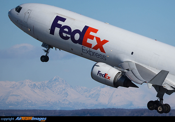 Beautiful wing flex on a very heavy Fedex MD-11 bound for Tokyo departing Anchorage Rwy 33. McDonnell Douglas MD-11F