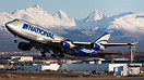 Amazing backdrop as a National Airlines Boeing 747-400F departs Anchor...