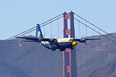 The Blue Angels C-130 Hercules performing over Golden Gate Bridge in S...